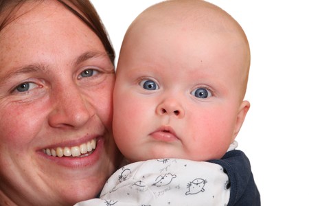 Smiling mother shows her babyの写真素材