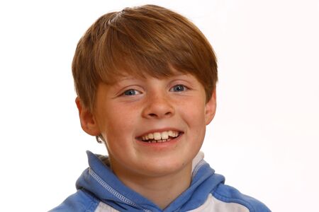 Portrait of a smiling young schoolboyの写真素材