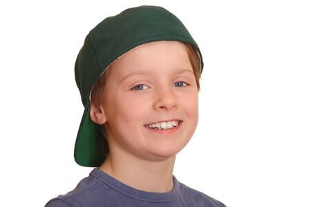 Portrait of a happy young boy with baseball capの写真素材
