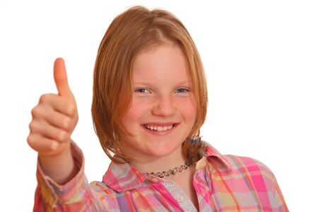 Portrait of a young blond teenage girl with thumbs upの写真素材