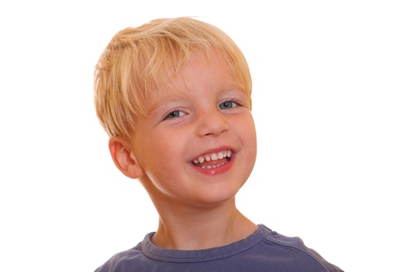 Portrait of a laughing young boyの写真素材