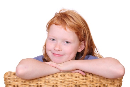 Portrait of a smiling red haired girl の写真素材