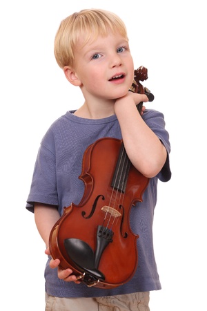Portrait of a young boy holding his violinの写真素材