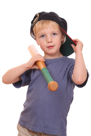 Portrait of a young baseball player holding a bat and wearing a capの写真素材
