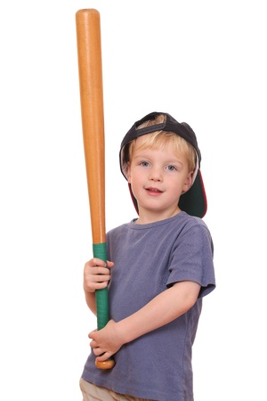 Portrait of a young baseball player holding a bat and wearing a capの写真素材