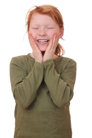 Portrait of a surprised young girl on white backgroundの写真素材