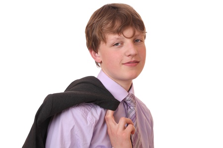 Portrait of a teenage boy in a business suit の写真素材
