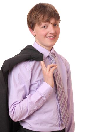 Portrait of a teenage boy in a business suit の写真素材