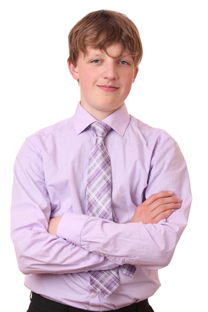 Portrait of a teenage boy in a business suit の写真素材