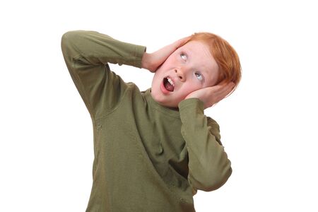 Scared young girl on white backgroundの写真素材