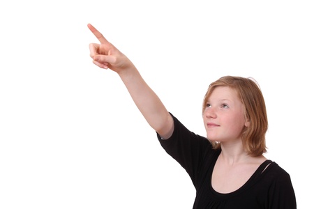 Girl points with her finger up on white backgroundの写真素材