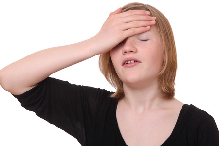 Young girl with headache on white backgroundの写真素材