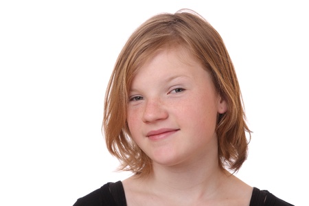 Portrait of a blond teenage girl on white backgroundの写真素材
