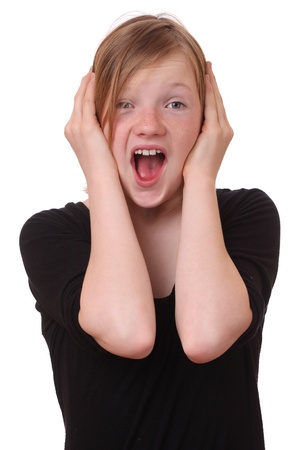 Screaming teenage girl on white backgroundの写真素材