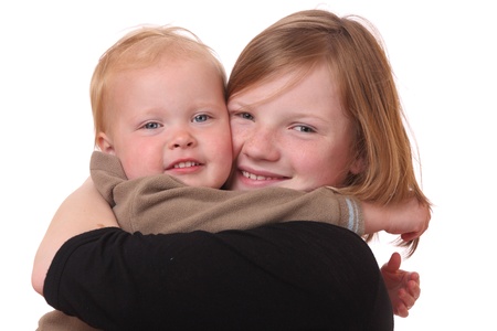 Two happy kids on white backgroundの写真素材
