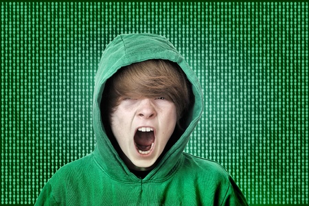 Screaming teenage boy caught in the matrixの写真素材