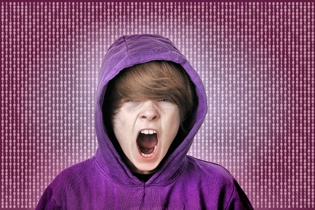 Screaming teenage boy caught in the matrixの写真素材