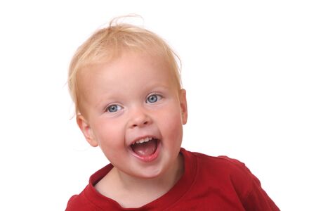 Portrait of a funny toddler on white backgroundの写真素材
