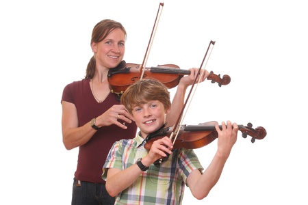 Woman and boy playing violin on white backgroundの写真素材