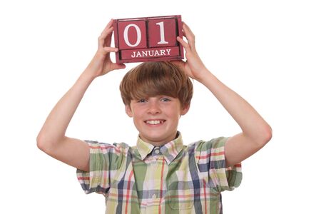 Young boy reminds of first of januaryの写真素材