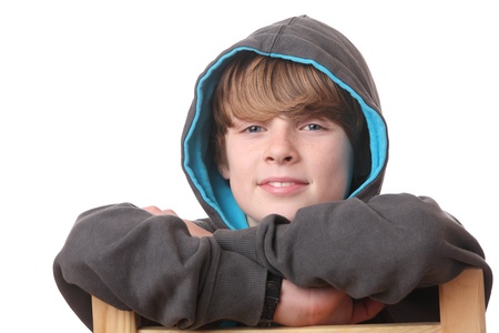 Portrait of a relaxed young boy wearing a hoodieの写真素材