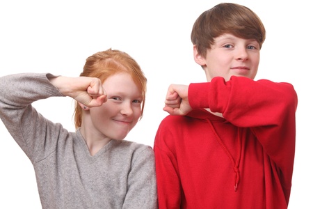 Two angry children on white backgroundの写真素材
