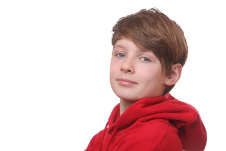 Portrait of a happy young boy on white backgroundの写真素材