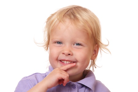 Portrait of a funny toddler on white backgroundの写真素材
