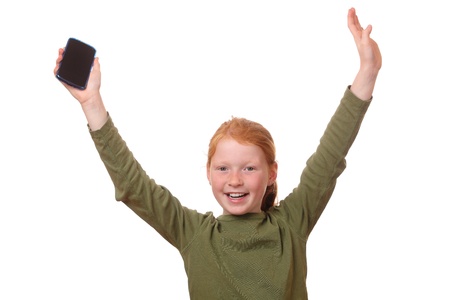 Happy young girl with her new smartphoneの写真素材