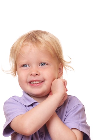 Portrait of a funny toddler on white backgroundの写真素材