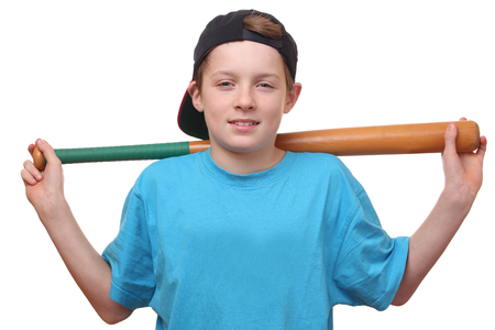 Portrait of a young baseball player on white backgroundの写真素材
