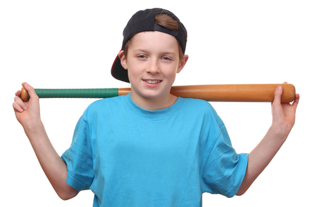 Portrait of a young baseball player on white backgroundの写真素材