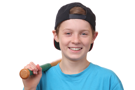 Portrait of a young baseball player on white backgroundの写真素材