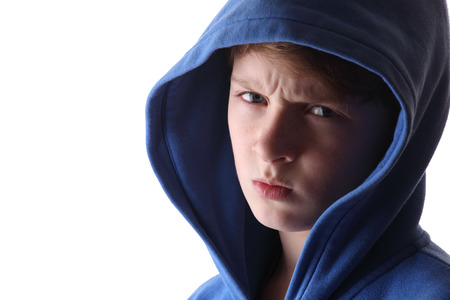 Portrait of an angry young boyの写真素材