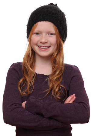 Portrait of a beautiful red-haired girl on white backgroundの写真素材