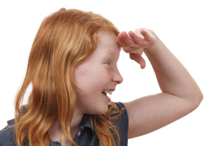 Portrait of a searching young girl on white backgroundの写真素材