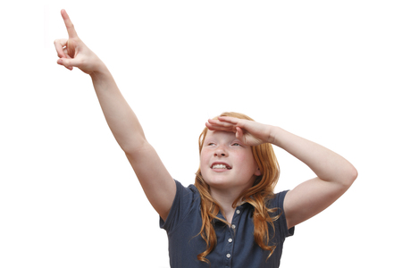 Portrait of a searching young girl on white backgroundの写真素材