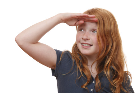 Portrait of a searching young girl on white backgroundの写真素材