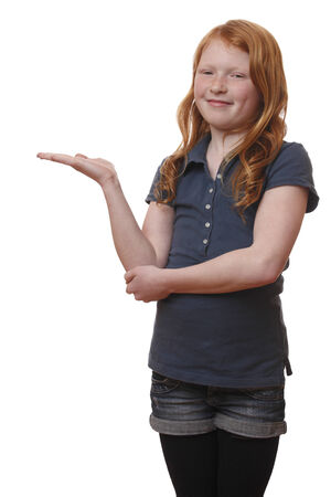 Portrait of a young girl presenting an idea on white backgroundの写真素材