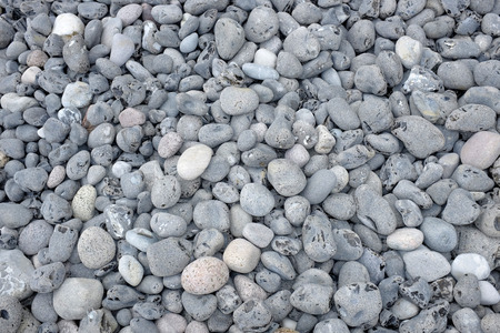 Close up of lots of pebbles at the beachの写真素材