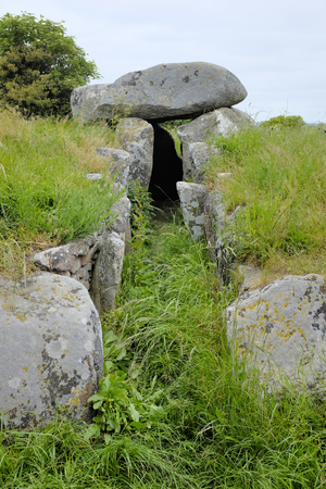 Grassy entrance of a prehistoric graveの写真素材