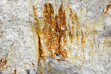 Close up of hematite   limonite on white chalk rockの写真素材