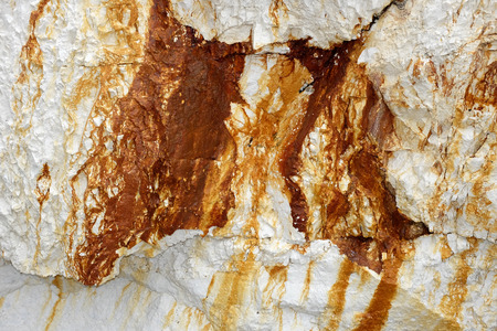 Close up of hematite   limonite on white chalk rockの写真素材