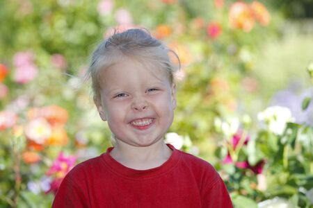 Portrait of a happy young girl outdoorsの写真素材