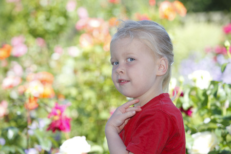Portrait of a happy young girl outdoorsの写真素材