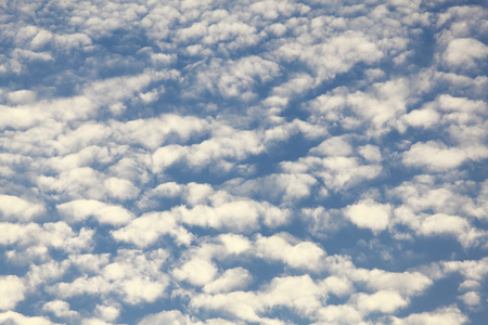 Blue sky with some white cirrus cloudsの写真素材