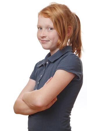 Portrait on a self confident girl on white backgroundの写真素材