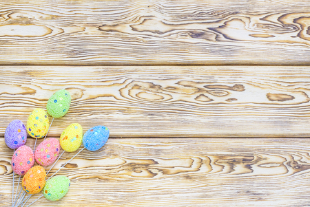 Easter eggs on rustic wooden table. Holiday background. copy spaceの写真素材