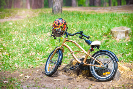 Bicycle in Summer grass field, classic bicycle,old bike style vintage for background, green grass design for postcard artwork.の写真素材