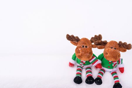 Christmas-tree toy deer on the snow. With a copy-space.の写真素材